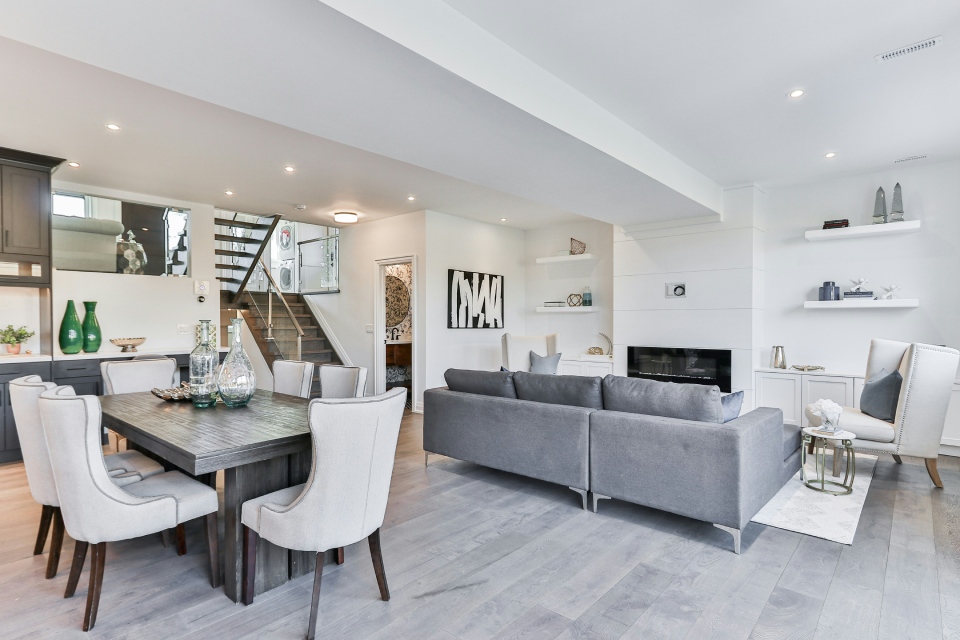 Modern living room with dining area decor.